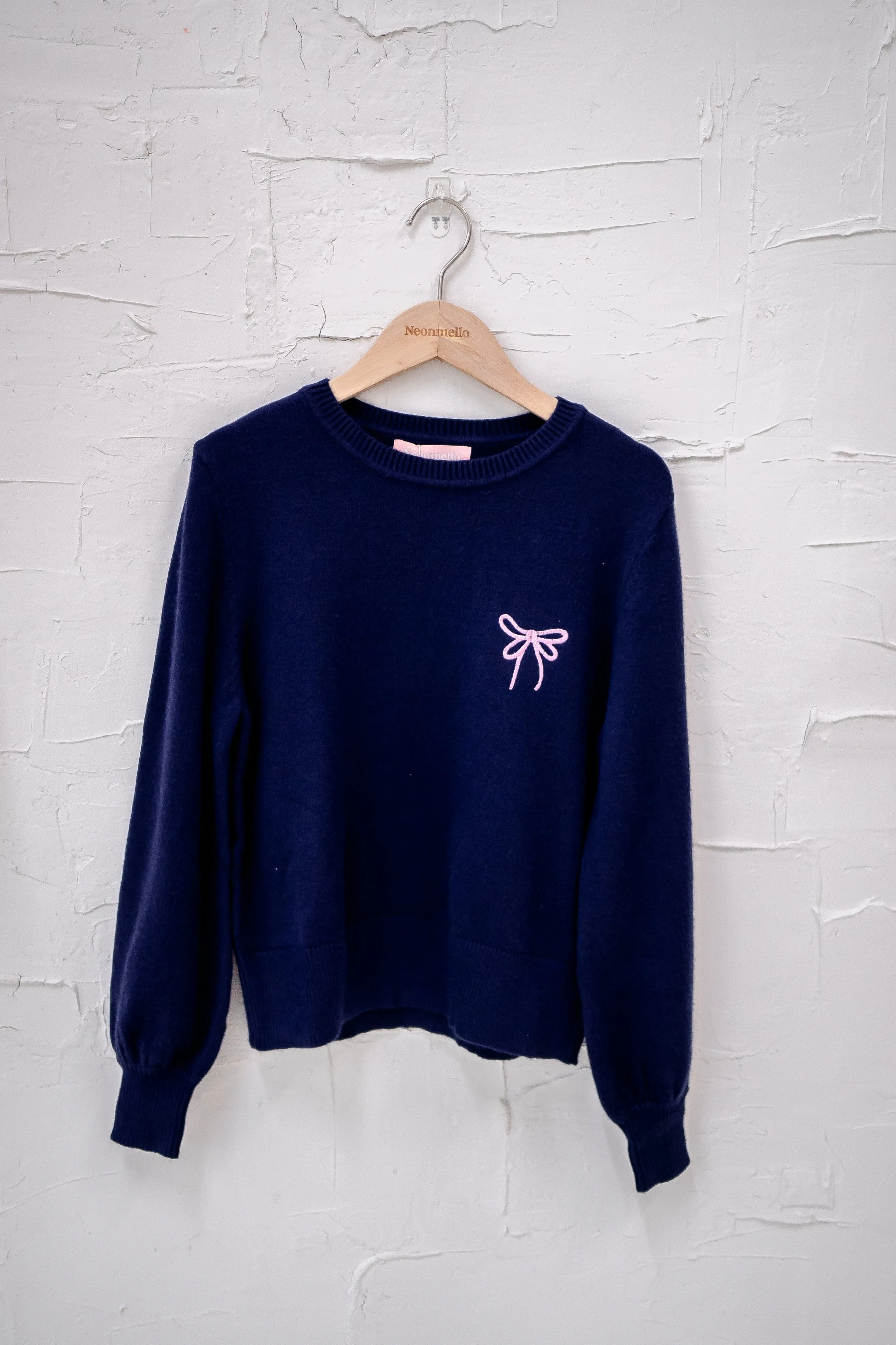 ALLURE RIBBON SWEATER IN NAVY